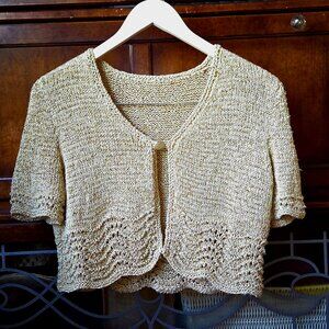 Elegant Golden knit with metallic thread open shrug
